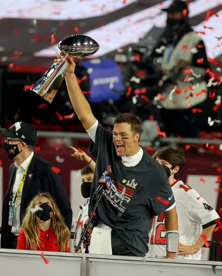 TAMPA, FLORIDA - FEBRUARY 07: Tom Brady #12 of the Tampa Bay Buccaneers celebrates with the Lombardi Trophy after defeating the Kansas City Chiefs in Super Bowl LV at Raymond James Stadium on February 07, 2021 in Tampa, Florida. The Buccaneers defeated the Chiefs 31-9. (Photo by Kevin C. Cox/Getty Images)