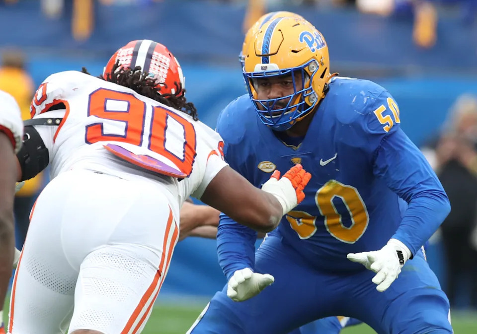 Pitt Panthers offensive lineman Jason Collier Jr. (50) blocks against Clemson Tigers defensive tackle Stephiylan Green (90). Mandatory Credit: Charles LeClaire-Imagn Images
