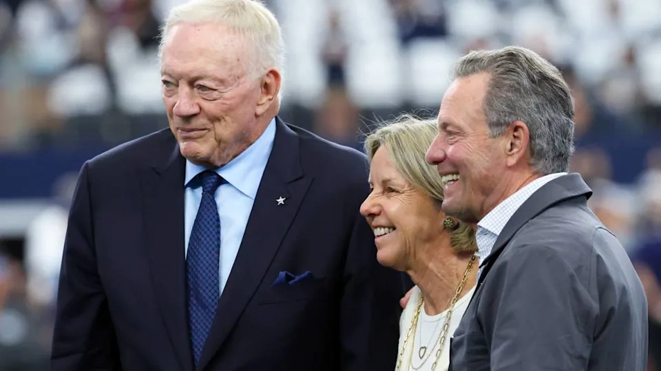 Oct 13, 2024; Arlington, Texas, USA; Dallas Cowboys owner Jerry Jones (left) takes a photo with Detroit Lions owner Sheila Ford Hamp and her husband Steve before the game at AT&T Stadium. Mandatory Credit: Kevin Jairaj-Imagn Images