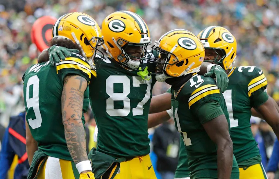 Green Bay Packers wide receiver Romeo Doubs (87) celebrates scoring a touchdown with wide receiver Christian Watson (9), wide receiver Jayden Reed (11) and running back Emanuel Wilson (31).Dan Powers&sol;USA TODAY NETWORK-Wisconsin &sol; USA TODAY NETWORK via Imagn Images