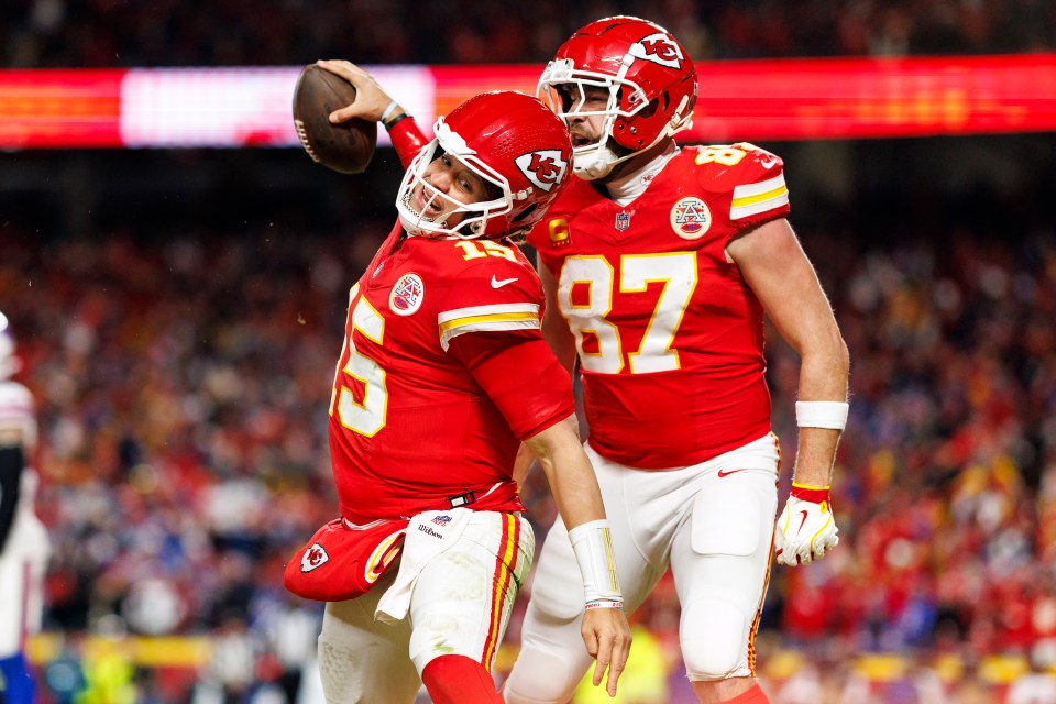 Patrick Mahomes #15 and Travis Kelce #87 of the Kansas City Chiefs celebrating a touchdown.