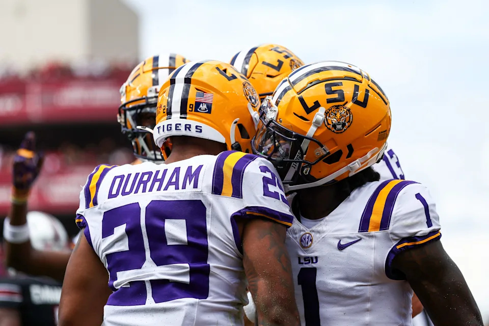 COLUMBIA, SOUTH CAROLINA - SEPTEMBER 14: Caden Durham #29 of the LSU Tigers celebrates with Aaron Anderson #1 of the LSU Tigers after scoring a touchdown during the second quarter against the South Carolina Gamecocks at Williams-Brice Stadium on September 14, 2024 in Columbia, South Carolina. (Photo by Isaiah Vazquez/Getty Images)