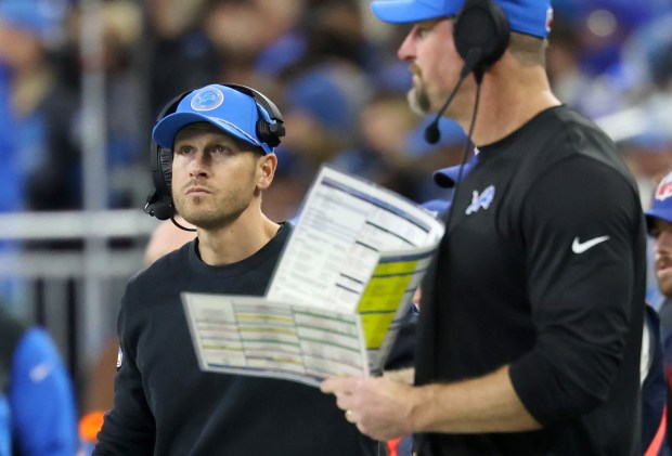 Lions offensive coordinator Ben Johnson, left, works alongside coach Dan Campbell during a game against the Bears on Nov. 28, 2024, in Detroit. (John J. Kim/Chicago Tribune)