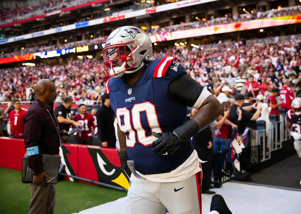 Dec 15, 2024; Glendale, Arizona, USA; New England Patriots defensive tackle Christian Barmore (90) against the Arizona Cardinals at State Farm Stadium. Mandatory Credit: Mark J. Rebilas-Imagn Images