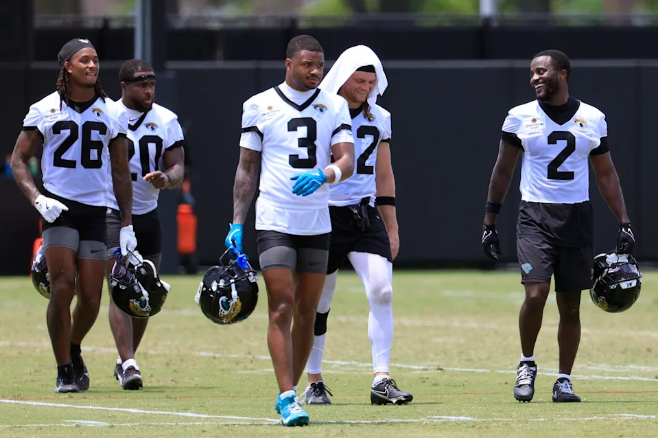 From left, Jacksonville Jaguars safety Antonio Johnson (26), safety Daniel Thomas (20), cornerback Tyson Campbell (3), safety Andrew Wingard (42) and cornerback Jourdan Lewis (2) walk off the field during the first organized team activity at Miller Electric Center Monday, May 19, 2025 in Jacksonville, Fla.