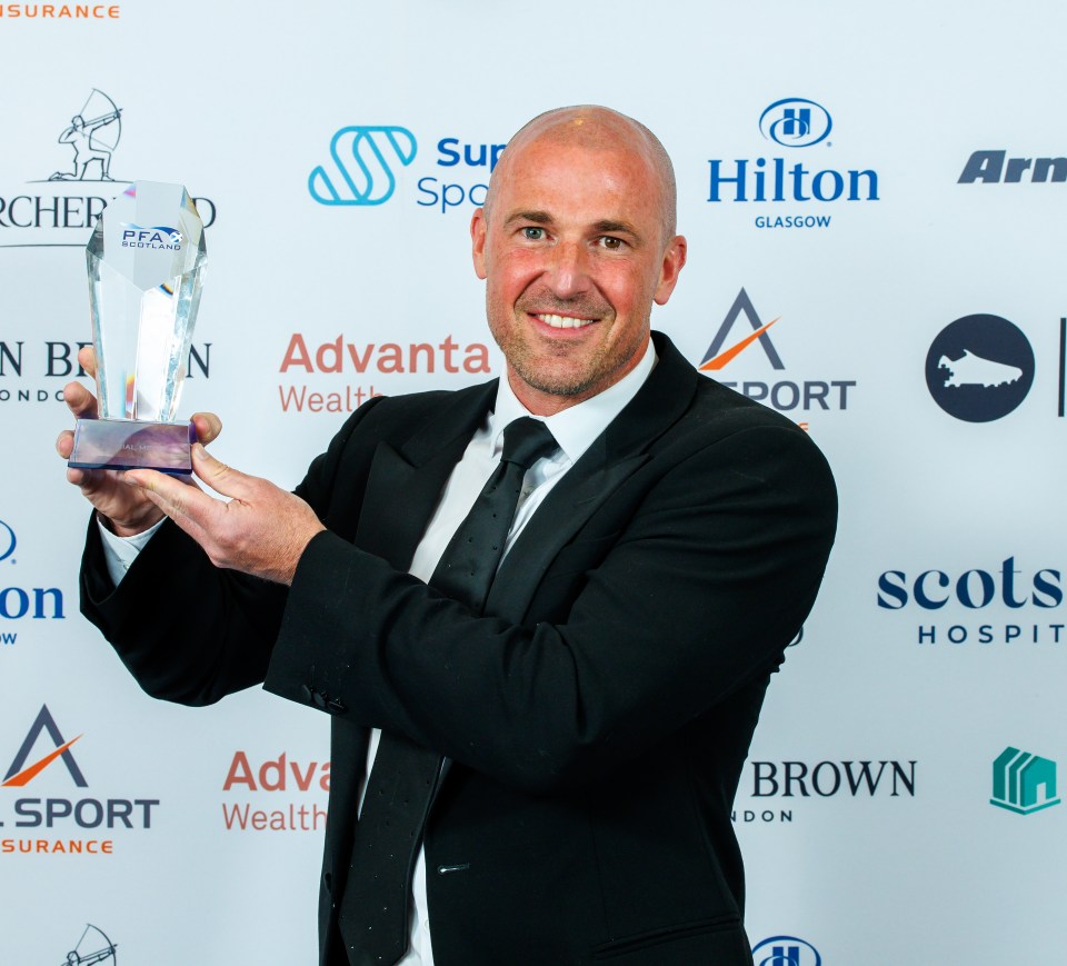 Paul Dalglish accepting a Special Merit Award.