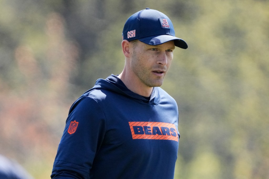 Chicago Bears head coach Ben Johnson walks the field during rookie minicamp at Halas Hall. 