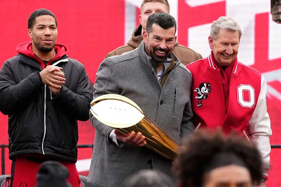 Ohio State Buckeyes head coach Ryan Day with the CFP National Championship trophy. Adam Cairns&sol;Columbus Dispatch &sol; USA TODAY NETWORK via Imagn Images