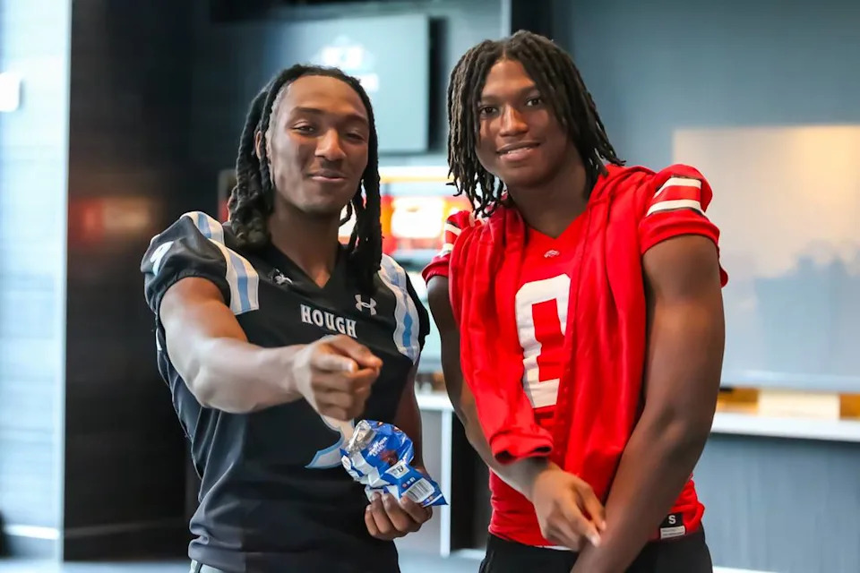Hough’s Samari Matthews (left) and South Pointe’s J’Zavien Currence at Wednesday’s Carolina Panthers’ Keep Pounding media day at Bank of America Stadium on May 7, 2025 Kelly Hood/Special to The Observer