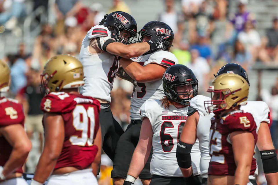 Sep 2, 2023; Chestnut Hill, Massachusetts, USA; Northern Illinois Huskies receiver Kacper Rutkiewicz (8) and Northern Illinois Huskies full back Brock Lampe (49) celebrate after a touchdown at Alumni Stadium. Mandatory Credit: Paul Rutherford-USA TODAY Sports