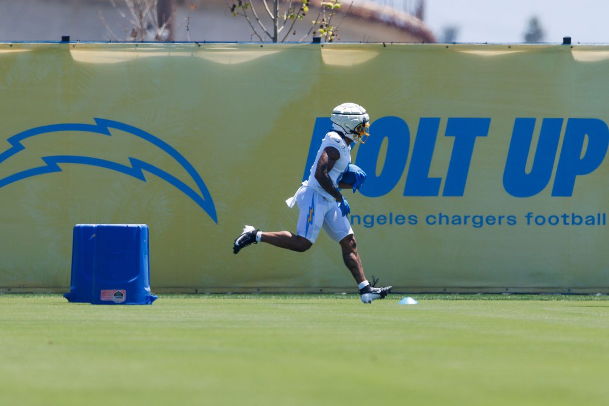 Omarion Hampton #8 runs with the ball during the Los Angeles Chargers Rookie Camp at The Bolt on May 9, 2025 in El Segundo, California. 