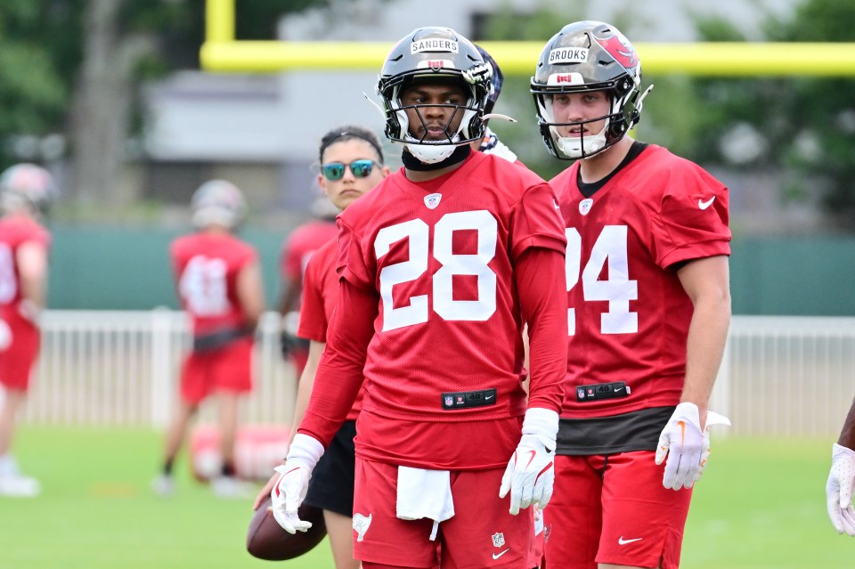 TAMPA, FLORIDA - MAY 09: Shilo Sanders #28 of the Tampa Bay Buccaneers looks on during the 2025 Tampa Bay Buccaneers Rookie Mini-Camp at AdventHealth Training Center on May 09, 2025 in Tampa, Florida. (Photo by Julio Aguilar/Getty Images)