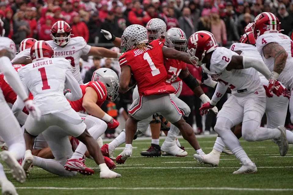 Ohio State Buckeyes running back Quinshon Judkins (1) slices through the Indiana Hoosiers' defense during the first half of the NCAA football game at Ohio Stadium.Adam Cairns/Columbus Dispatch / USA TODAY NETWORK via Imagn Images