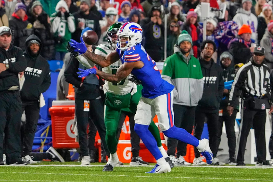 Nov 19, 2023; Orchard Park, New York, USA; Buffalo Bills cornerback Rasul Douglas (31) steps in front of New York Jets wide receiver Garrett Wilson (17) and intercepts a pass during the first half at Highmark Stadium. Mandatory Credit: Gregory Fisher-USA TODAY Sports