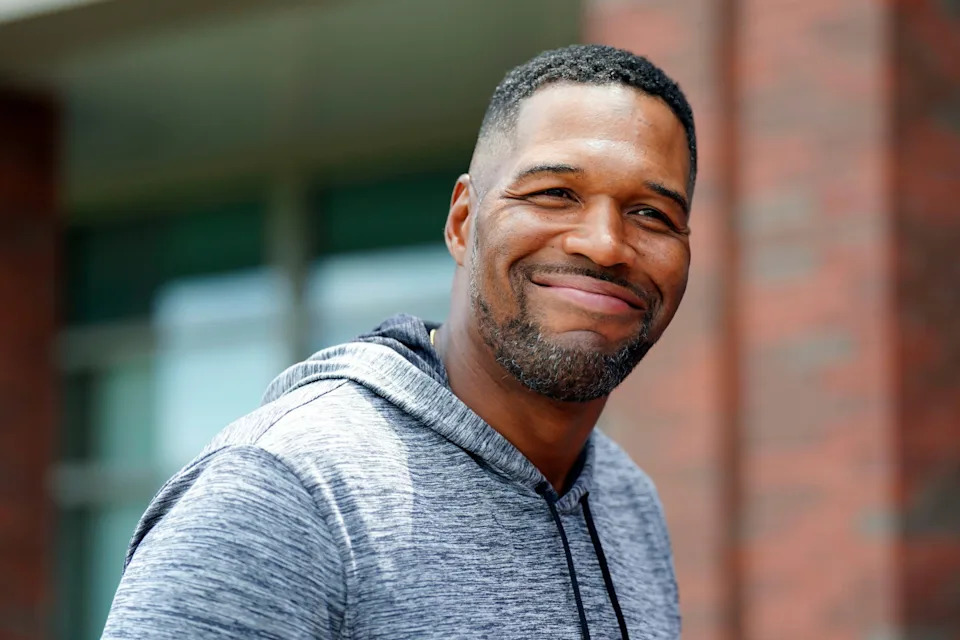 NFL legend Michael Strahan greets reporters after the first day of mandatory minicamp at the New York Giants training center in East Rutherford, New Jersey.Danielle Parhizkaran&sol;NorthJersey&period;com &sol; USA TODAY NETWORK via Imagn Images