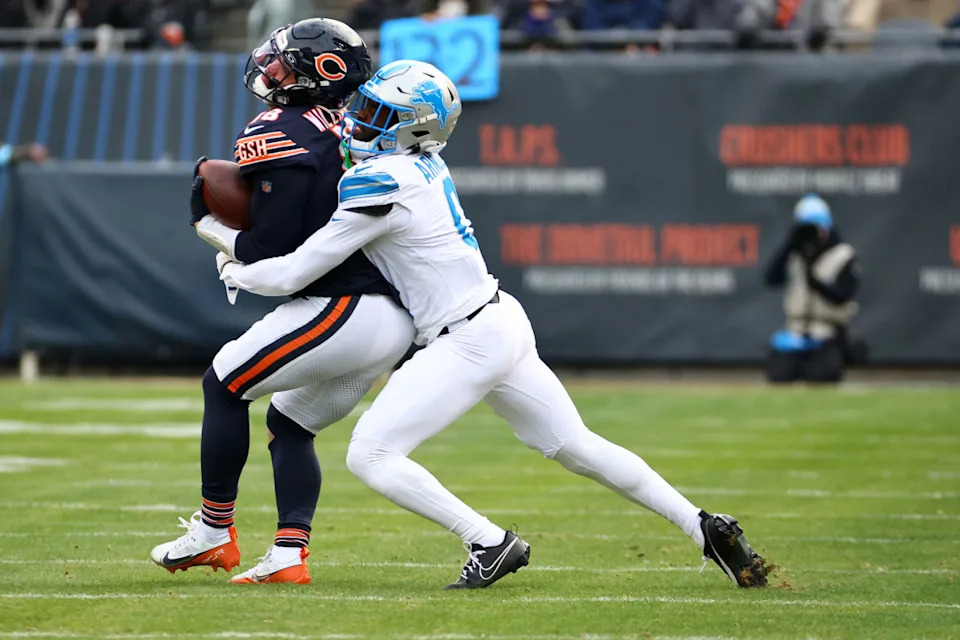 Detroit Lions cornerback Terrion Arnold tackling Caleb WilliamsMike Dinovo-Imagn Images