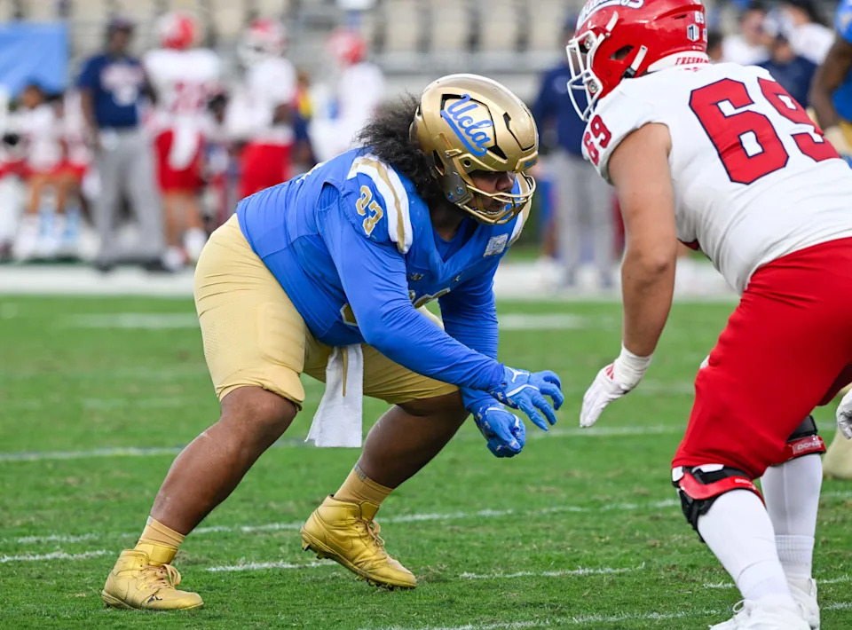 Nov 30, 2024; Pasadena, California, USA; UCLA Bruins defensive lineman Jay Toia (93) against the Fresno State Bulldogs at Rose Bowl. Mandatory Credit: Robert Hanashiro-Imagn Images