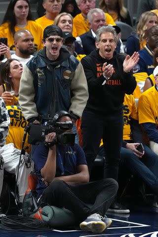 Dylan Buell/Getty Timothée Chalamet and Ben Stiller at the New York Knicks and Indiana Pacers game on May 27, 2025 in Indianapolis, Indiana.