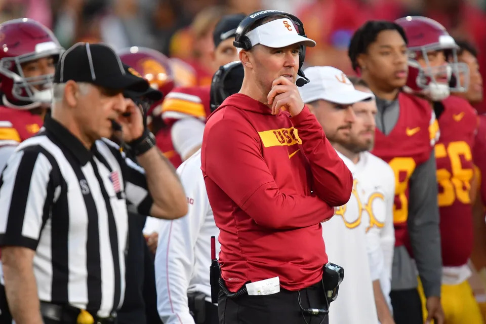 Nov 16, 2024; Los Angeles, California, USA; Southern California Trojans head coach Lincoln Riley watches game action against the Nebraska Cornhuskers during the second half at the Los Angeles Memorial Coliseum. Mandatory Credit: Gary A. Vasquez-Imagn Images