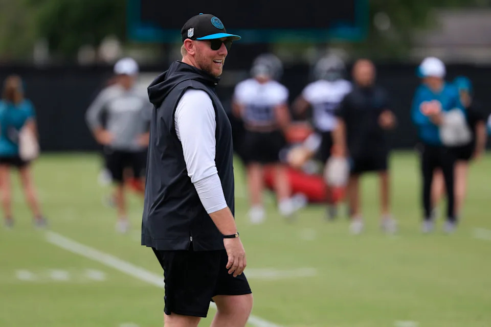 Jacksonville Jaguars head coach Ethan Coen looks on during a rookie minicamp at Miller Electric Center Saturday, May 10, 2025 in Jacksonville, Fla. [Corey Perrine/Florida Times-Union]