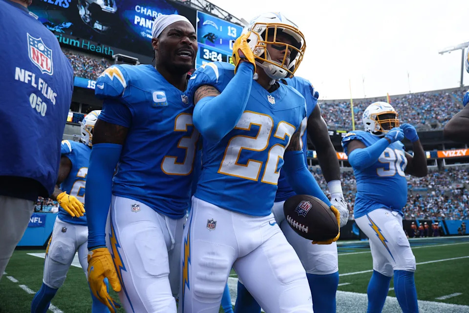 CHARLOTTE, NORTH CAROLINA - SEPTEMBER 15: Elijah Molden #22 of the Los Angeles Chargers celebrates after an interception during the second quarter against the Carolina Panthers at Bank of America Stadium on September 15, 2024 in Charlotte, North Carolina. (Photo by Jared C. Tilton/Getty Images)