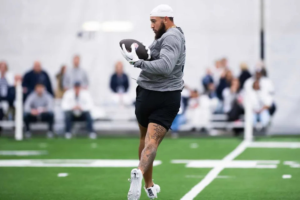 Wide receiver Julian Fleming catches a pass during Penn State's Pro Day in Holuba Hall© Dan Rainville &sol; USA TODAY NETWORK via Imagn Images