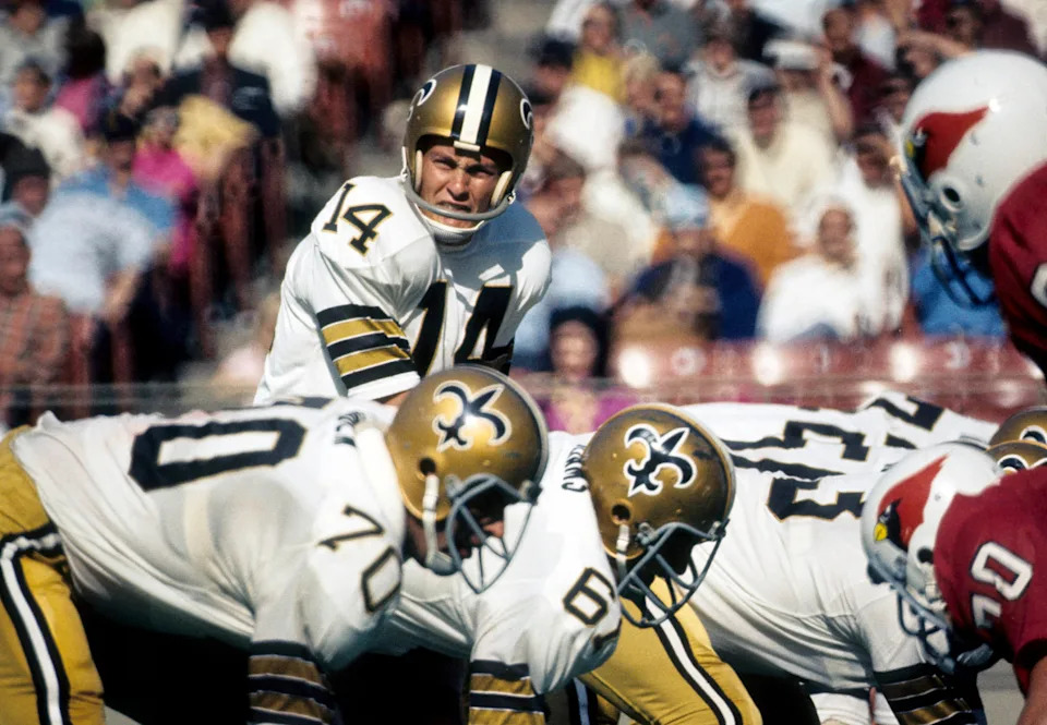 Oct 11, 1970; St. Louis, MO, USA; FILE PHOTO; New Orleans Saints quarterback Edd Hargett (14) at the line of scrimmage against the St. Louis Cardinals at Busch Stadium. Mandatory Credit: Herb Weitman-USA TODAY Sports