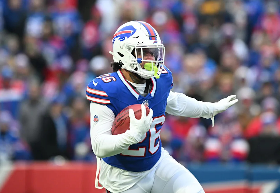 Dec 31, 2023; Orchard Park, New York, USA; Buffalo Bills running back Ty Johnson (26) returns a kickoff in the second quarter against the New England Patriots at Highmark Stadium. Mandatory Credit: Mark Konezny-USA TODAY Sports