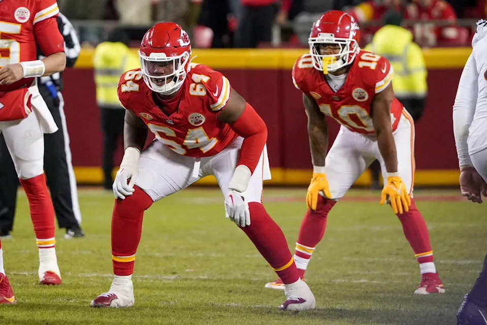 Kansas City Chiefs offensive tackle Wanya Morris (64) and running back Isiah Pacheco (10) at the line of scrimmage against the Cincinnati Bengals during the game at GEHA Field at Arrowhead Stadium. © Denny Medley-USA TODAY Sports