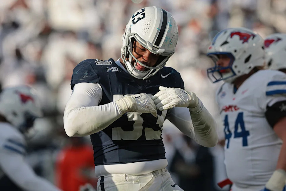 Dec 21, 2024; University Park, Pennsylvania, USA; Penn State Nittany Lions defensive end Dani Dennis-Sutton (33) reacts after a defensive stop during the second half against the Southern Methodist Mustangs at Beaver Stadium. Mandatory Credit: Vincent Carchietta-Imagn Images