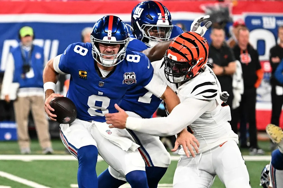 Giants quarterback Daniel Jones (8) is sacked by Cincinnati Bengals defensive end Trey Hendrickson (91) during the second quarter of a game at MetLife Stadium in East Rutherford, N.J. on October 13, 2024. Bill Kostroun/New York Post