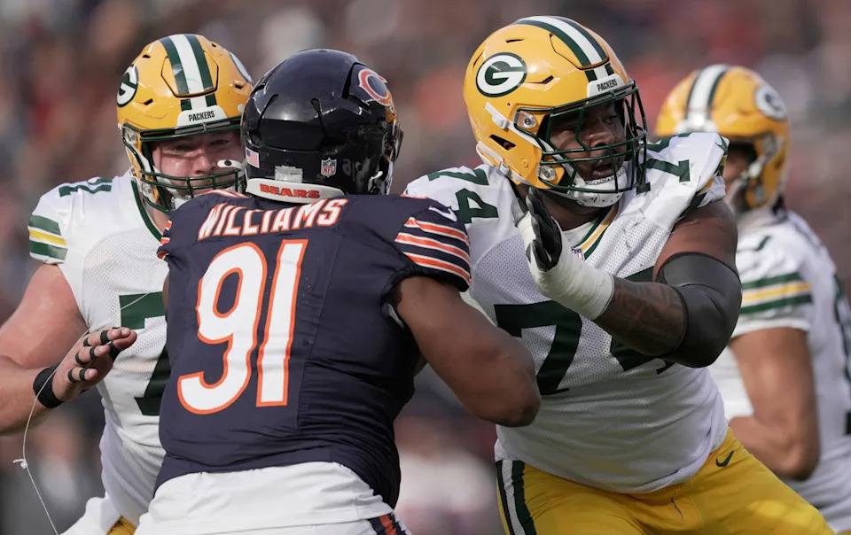 Green Bay Packers guard Elgton Jenkins (74) blocks Chicago Bears defensive tackle Chris Williams (91) during the first quarter of their game Sunday, November 17, 2024 at Solider Field in Chicago, Illinois.