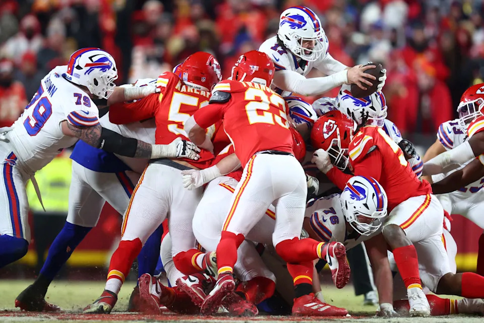 Buffalo Bills quarterback Josh Allen (17) dives for a first down against the Kansas City Chiefs during the second half in the AFC Championship game at GEHA Field at Arrowhead Stadium.Mark J&period; Rebilas-Imagn Images