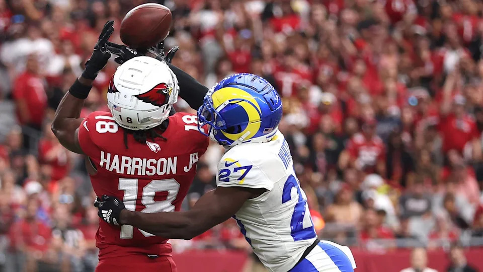 <div>Marvin Harrison Jr. #18 of the Arizona Cardinals catches a touchdown pass in front of Tre'Davious White #27 of the Los Angeles Rams during the first quarter at State Farm Stadium on September 15, 2024, in Glendale, Arizona.</div><strong>(Photo by Christian Petersen/Getty Images)</strong>