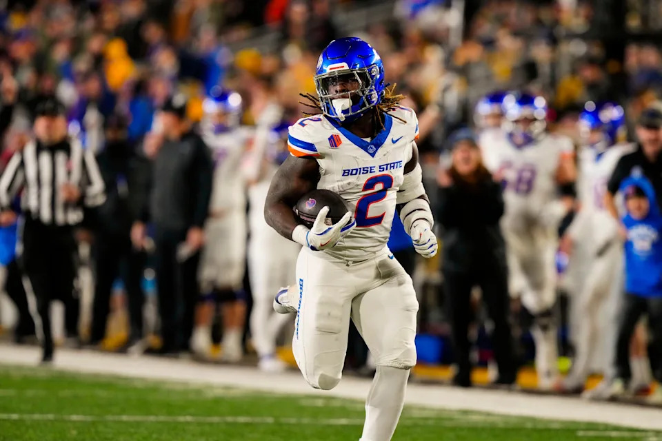 Nov 23, 2024; Laramie, Wyoming, USA; Boise State Broncos running back and Heisman Trophy candidate Ashton Jeanty (2) runs for a touchdown against the Wyoming Cowboys during the first quarter at Jonah Field at War Memorial Stadium. Mandatory Credit: Troy Babbitt-Imagn Images