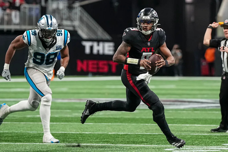 Atlanta Falcons QB Michael Penix Jr rolls out against the Carolina Panthers.