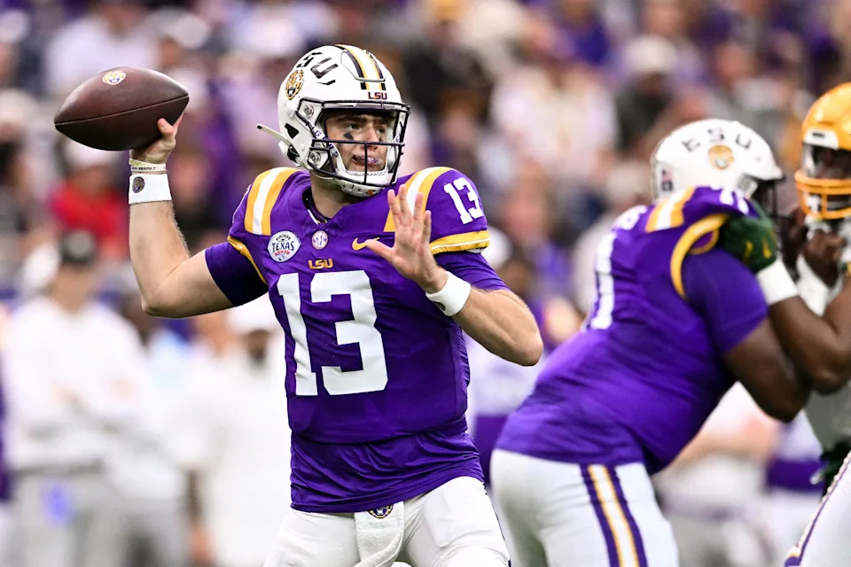 Dec 31, 2024; Houston, TX, USA; LSU Tigers quarterback Garrett Nussmeier (13) throws a pass during the first half against the Baylor Bears at NRG Stadium. The Tigers defeat the Bears 44-31. Mandatory Credit: Maria Lysaker-Imagn Images