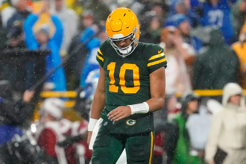Nov 3, 2024; Green Bay, Wisconsin, USA; Green Bay Packers quarterback Jordan Love (10) hangs his head after throwing an interception during the second quarter against the Detroit Lions at Lambeau Field. Mandatory Credit: Jeff Hanisch-Imagn Images