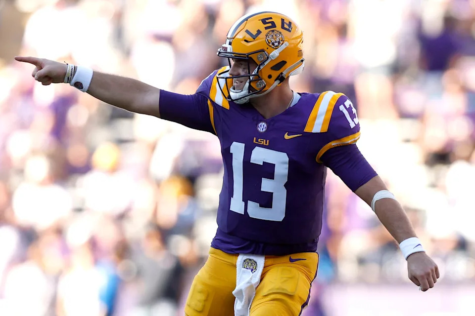 BATON ROUGE, LOUISIANA - SEPTEMBER 21: Garrett Nussmeier #13 of the LSU Tigers reacts after throwing a touchdown pass during the fourth quarter of an NCAA football game against the UCLA Bruins at Tiger Stadium on September 21, 2024 in Baton Rouge, Louisiana. (Photo by Sean Gardner/Getty Images)
