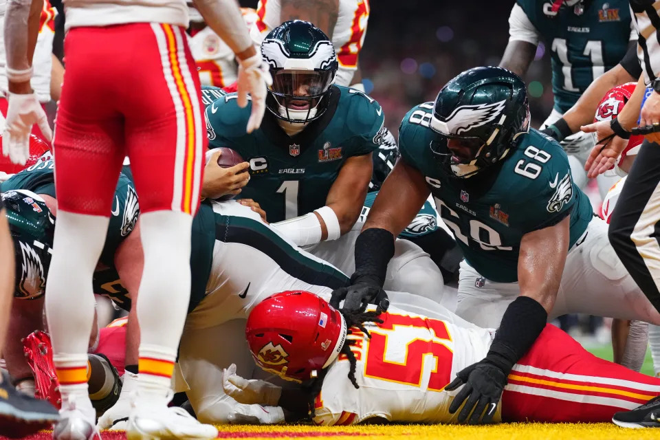 NEW ORLEANS, LA - FEBRUARY 09: Jalen Hurts #1 of the Philadelphia Eagles scores a touchdown on a quarterback sneak against the Kansas City Chiefs during Super Bowl LIX at Caesars Superdome on February 9, 2025 in New Orleans, Louisiana. (Photo by Cooper Neill/Getty Images)