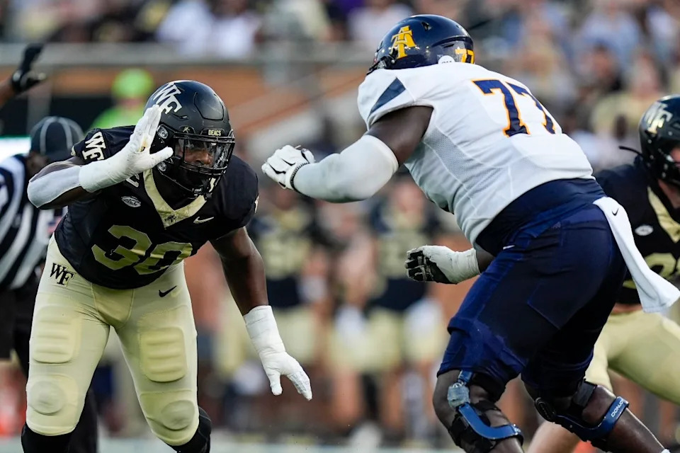 Wake Forest Demon Deacons defensive lineman Jasheen Davis (30) rushes against the North Carolina A&T Aggies. Mandatory Credit: Jim Dedmon-Imagn Images
