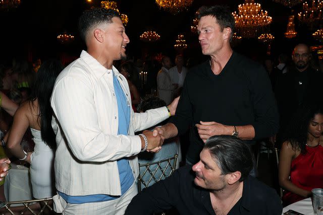Alexander Tamargo/Getty Patrick Mahomes and Tom Brady at a Miami F1 party
