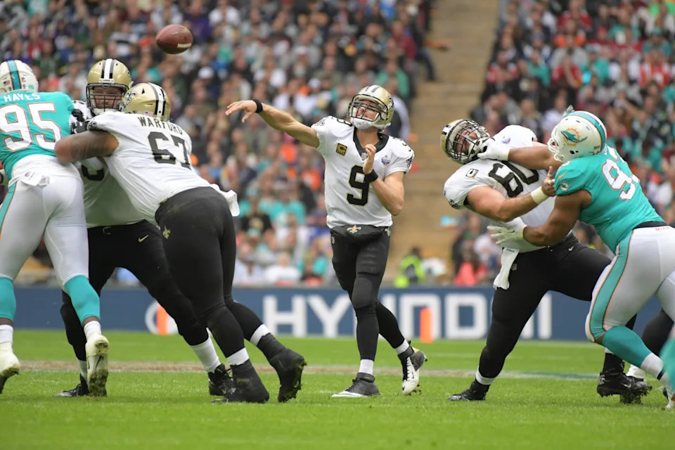 Oct 1, 2017; New Orleans Saints quarterback Drew Brees (9) throws a pass against the Miami Dolphins during the NFL International Series game at Wembley Stadium. Mandatory Credit: Kirby Lee-Imagn Images