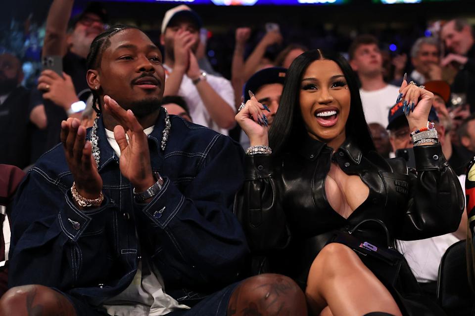 Stefon Diggs and Cardi B were all smiles at Monday's NBA playoff game between the Knicks and Celtics (Getty Images)