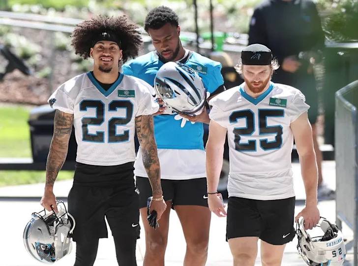 Carolina Panthers rookie safety Lathan Ransom, left and safety Isaac Gifford, right, walk to the team’s rookie minicamp practice on Friday, May 9, 2025. JEFF SINER/jsiner@charlotteobserver.com