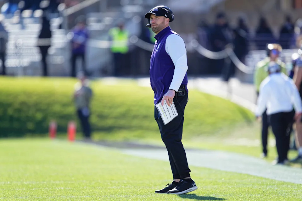Nov 18, 2023; Evanston, Illinois, USA; Northwestern Wildcats head coach David Braun watches his team play against the Purdue Boilermakers at Ryan Field. Mandatory Credit: Jamie Sabau-USA TODAY Sports