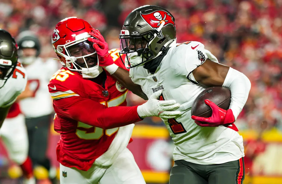 Tampa Bay Buccaneers running back Rachaad White (1) and Kansas City Chiefs linebacker Joshua Uche (55)Jay Biggerstaff-Imagn Images