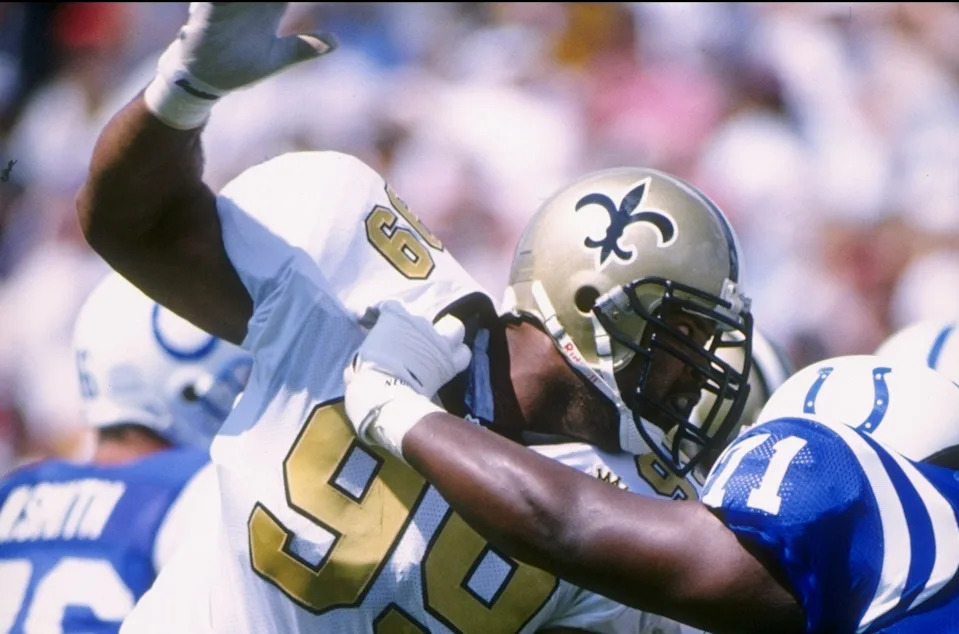 27 Jul 1996: Defensiive lineman Willie Broughton #99 of the New Orleans Saints attempts to power through an attempted block of an offensive lineman from the Indianapolis Colts during the Saints 10-3 loss to the Indianapolis Colts at the Hall of Fame Game