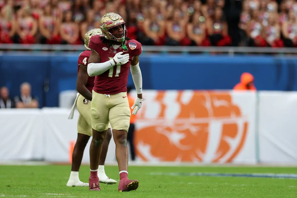 Dec 30, 2023; Miami Gardens, FL, USA; Florida State Seminoles defensive lineman Patrick Payton (11) reacts against the Georgia Bulldogs during the first half in the 2023 Orange Bowl at Hard Rock Stadium. Mandatory Credit: Nathan Ray Seebeck-USA TODAY Sports