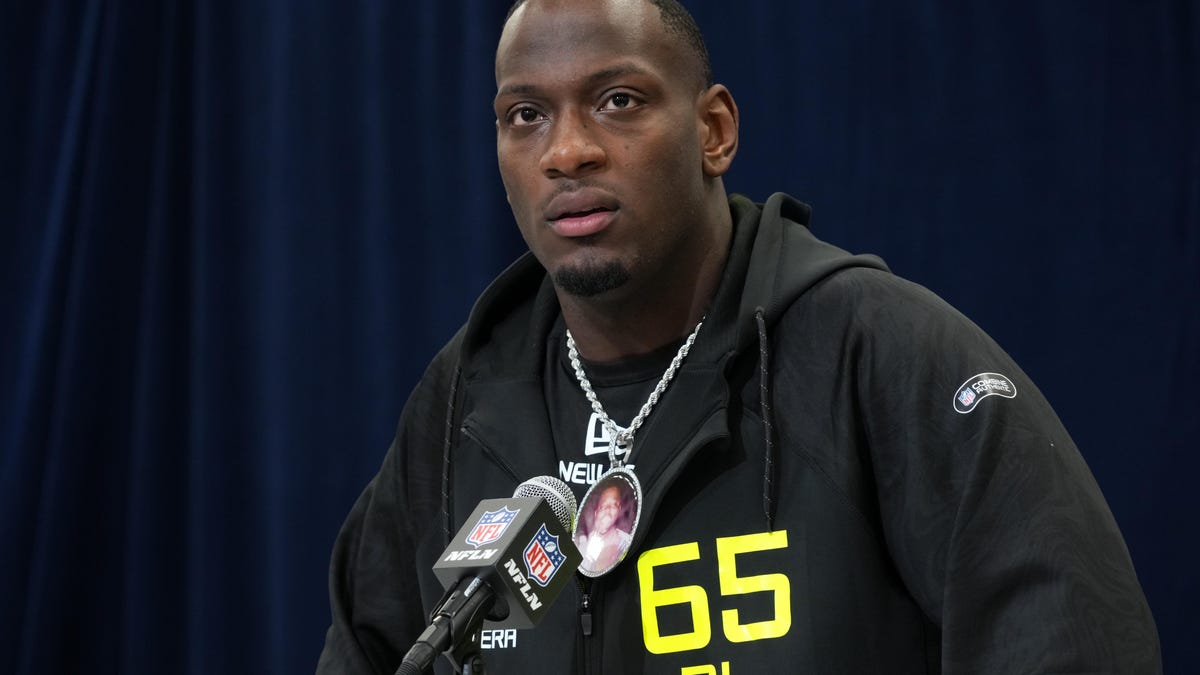 Why haven't the Panthers signed OLB Nic Scourton yet?